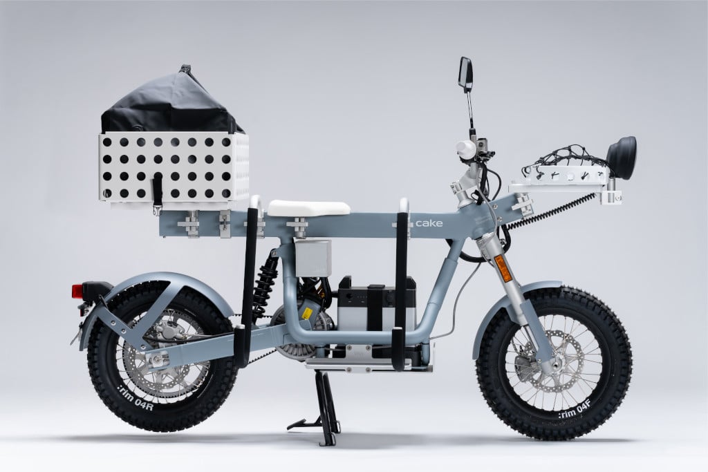 Cake-Ösa-Flex-E-Transportbike-E-Motorrad  in grau seitlich komplett inkl.  vollem Korb hinten